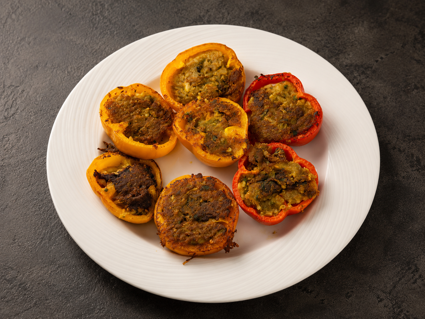 Colourful stuffed peppers prepared by Geordie Indian Kitchen